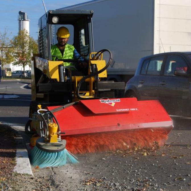 sweeper-on-compact-loader