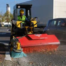 sweeper-on-compact-loader